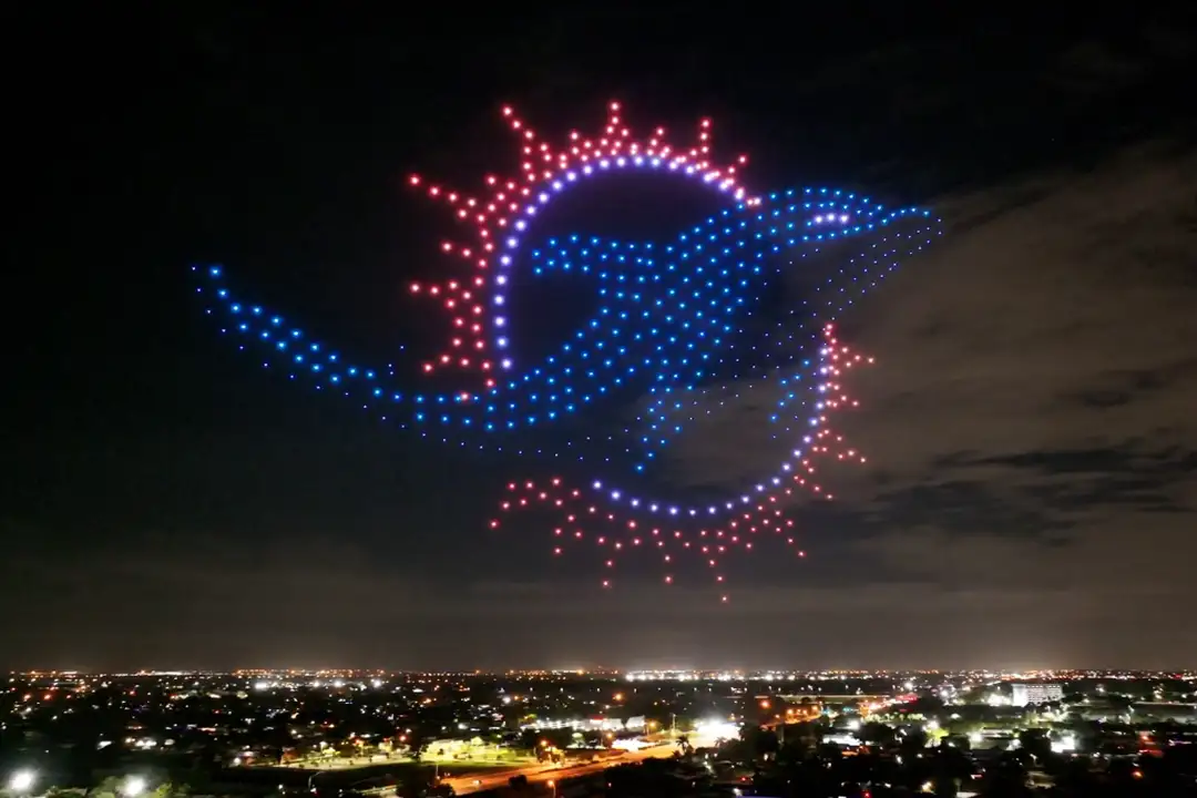 drone light show pixis drones NFL NBA MLS NCAA teams miami dolphins logo