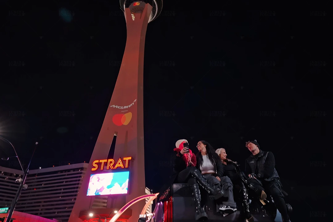 f1 Mastercard McLaren stratosphere friend group in front of Strat