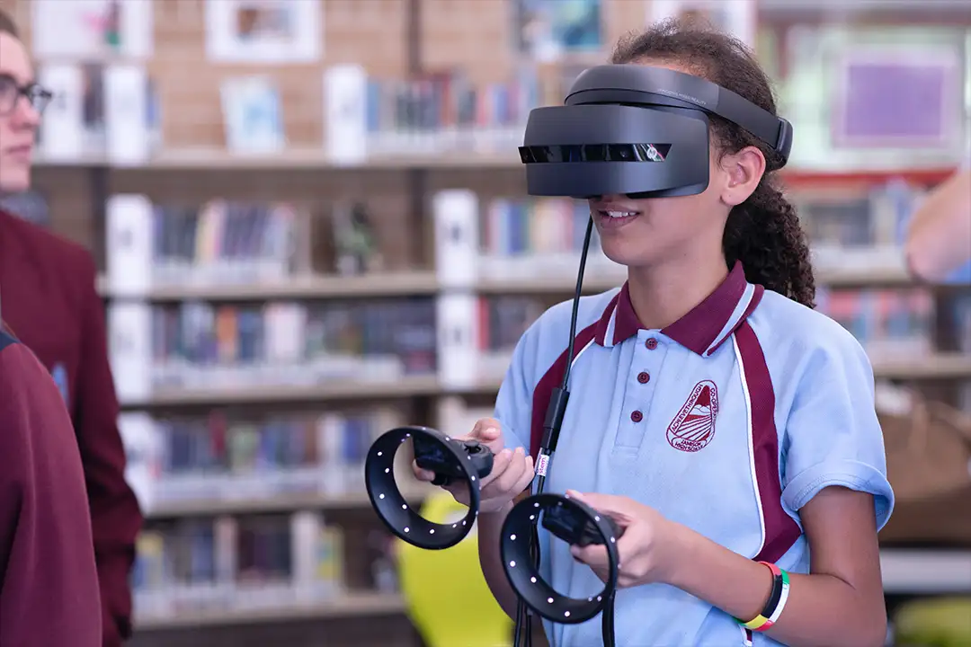 kid wearing vr goggles at chool